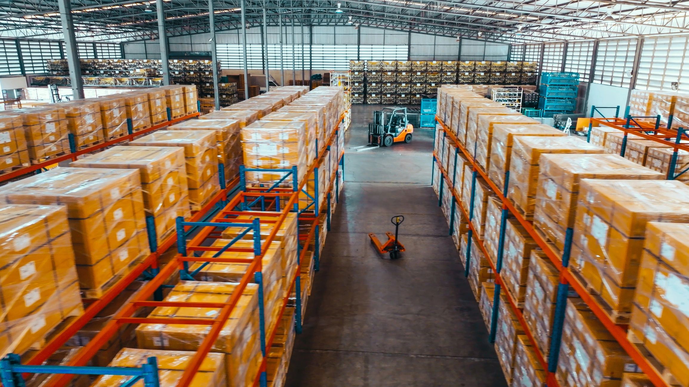 Warehouse shelves with packaged goods ready for distribution