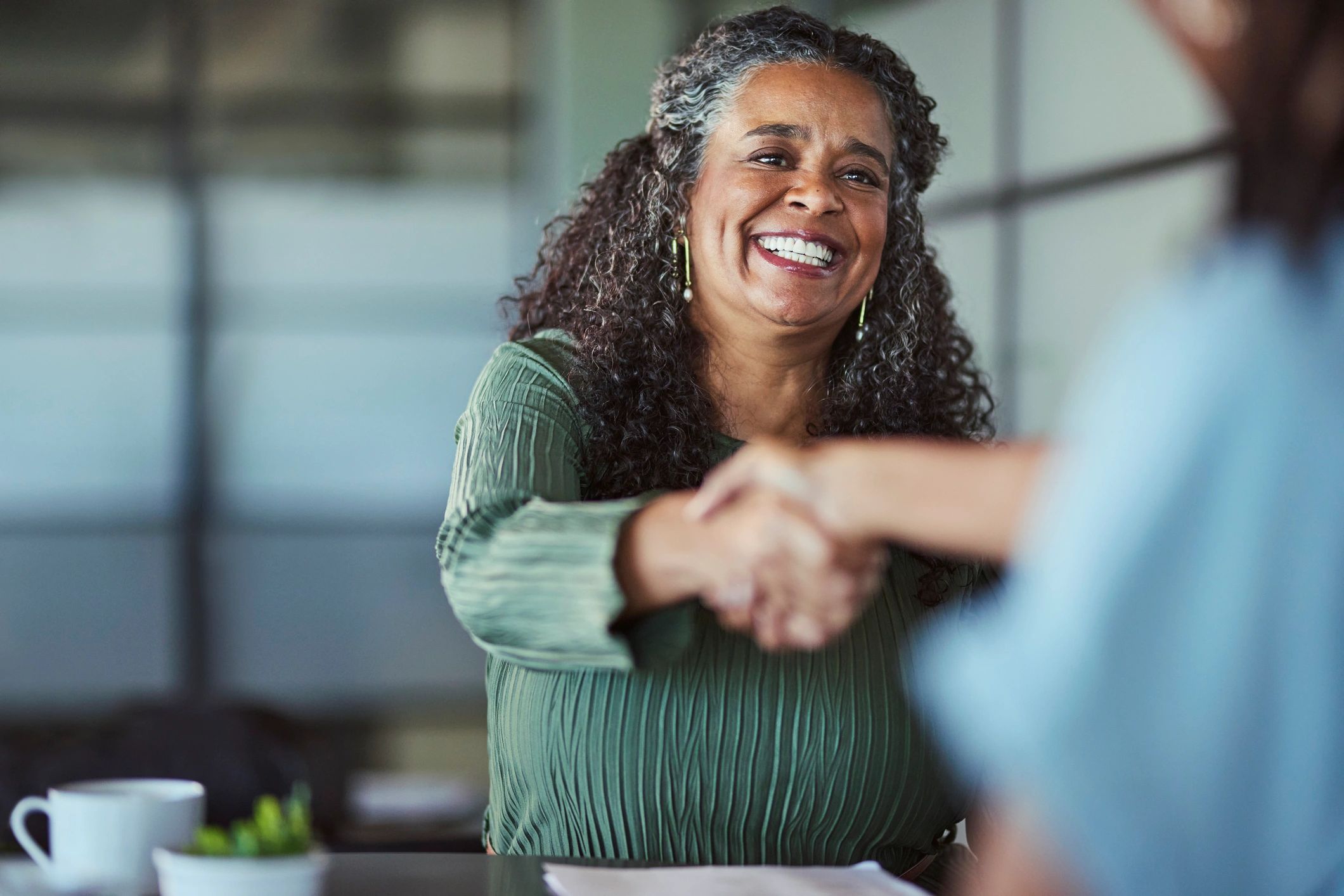 Business handshake representing strategic sourcing partnership